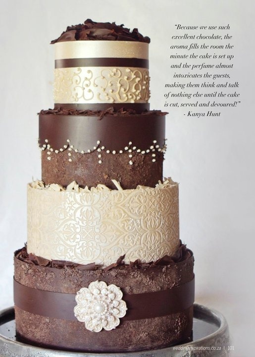 Milk-and-white-chocolate-embossed-wedding-cake-with-scroll-piping-and-chocolate-brooch